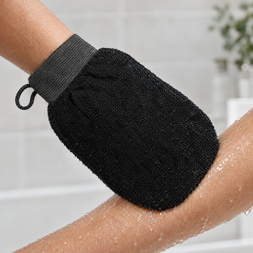 The mitt worked along a damp forearm in the shower
